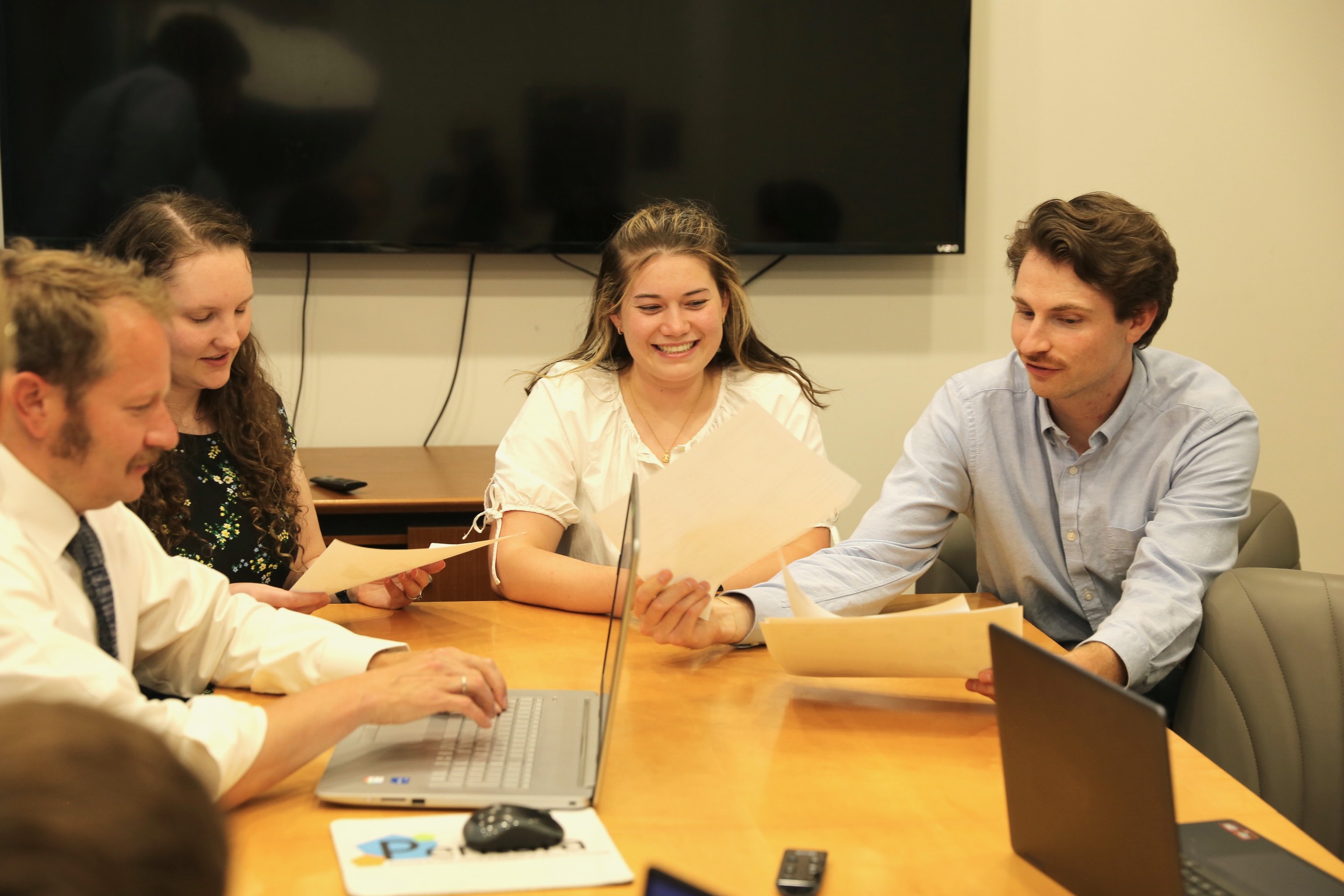 employees working around desk